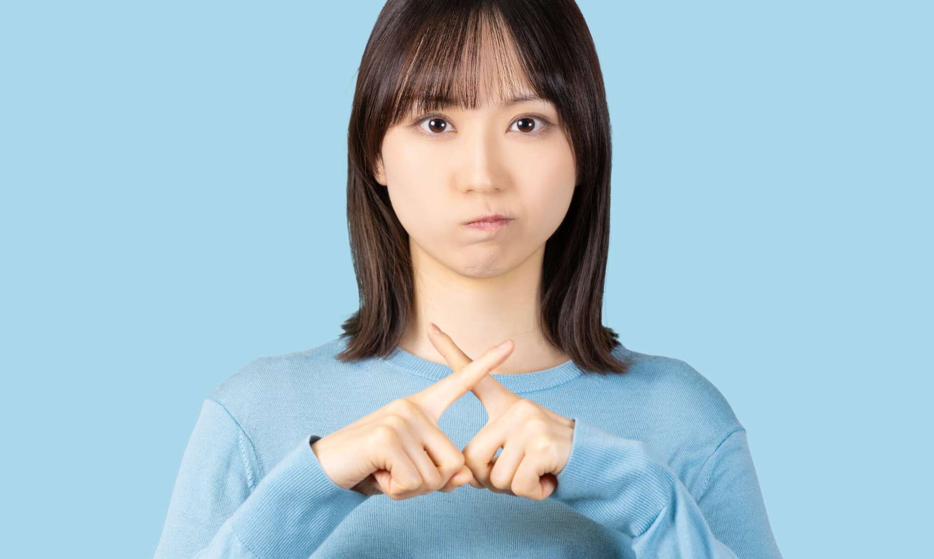 ホワイトニングできないと伝える女性